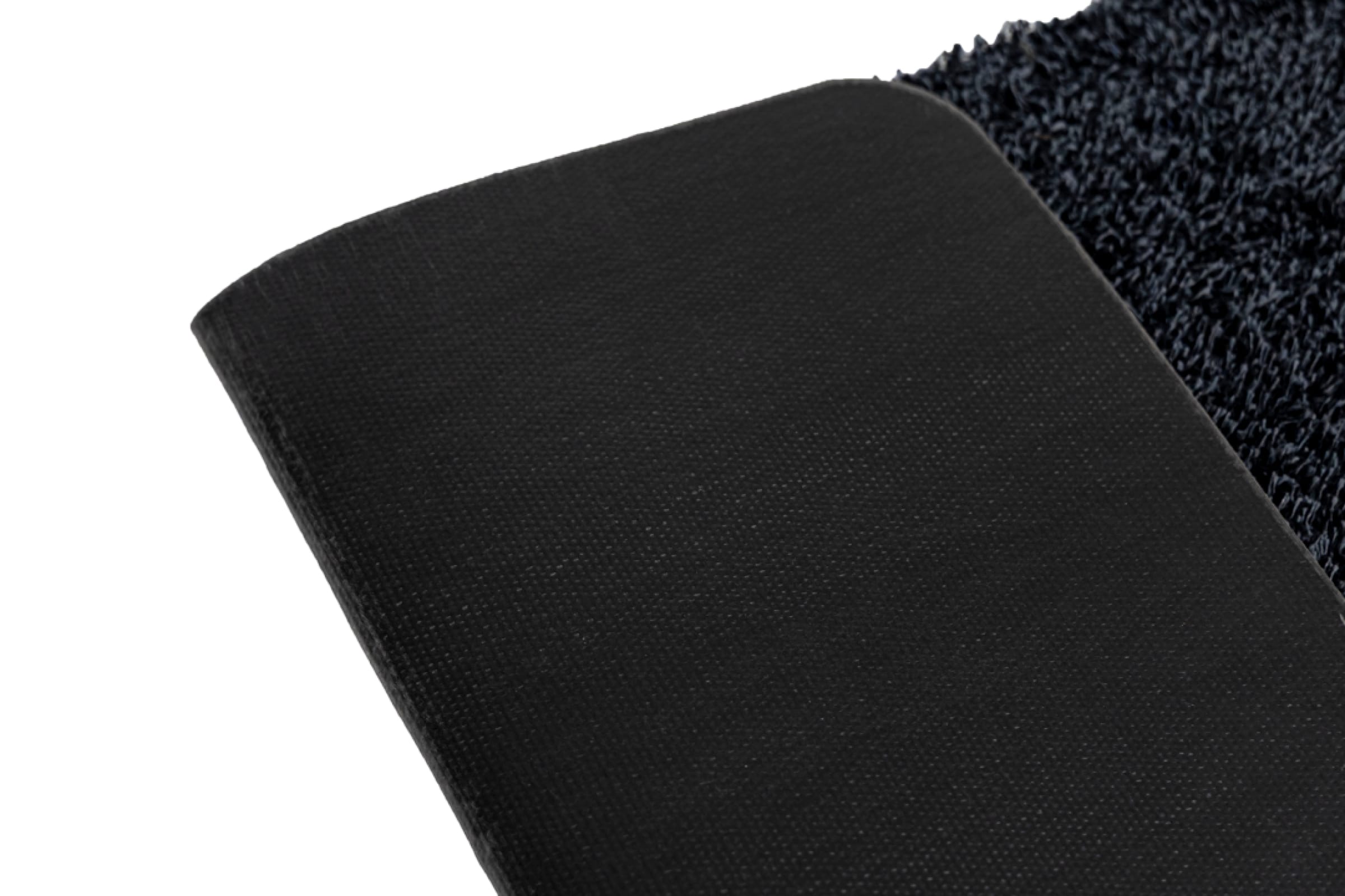 Bovenaanzicht van de Aquaplus Droogloopmat. Op de foto is de backing goed te zien. Het betreft hier de Antraciet variant.